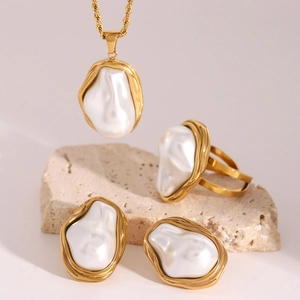 Elegant 18k gold plated stainless steel jewelry set with baroque pearls on stone