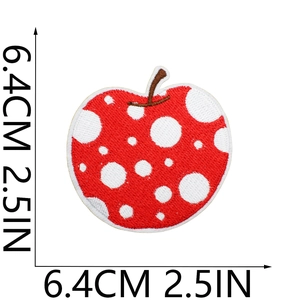 Detailed close-up of red polka dot apple embroidered patch measuring 6.4cm x 6.4cm