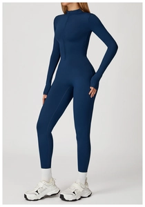 Detail of navy blue fleece yoga jumpsuit featuring thumbholes and half-zip collar design