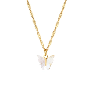 Gold twist chain necklace with iridescent white shell butterfly pendant on white background