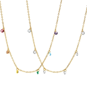 Elegant gold titanium steel necklace with colorful round zircon stones on white backdrop