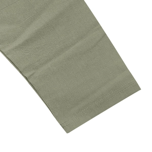 Detail view of olive green linen fabric texture with premium double-stitch sewing finish