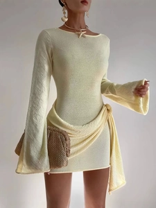 Elegant beige terry cloth long sleeve dress with flare sleeves and waist tie detail