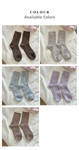 Detail view of thickened wool socks in five gradient colors with ribbed knit texture