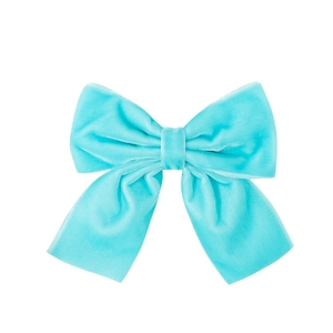 Close-up of light blue velvet bow hair clip showing soft fabric texture and detail