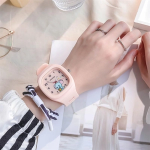 Pink silicone square watch with cartoon elephant pattern worn in a lifestyle setting