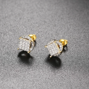Close-up of gold-plated hip hop stud earrings with square cubic zirconia inlay