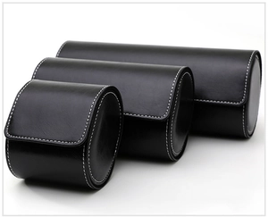 Three sizes of black leather watch storage cases with elegant white stitching detail