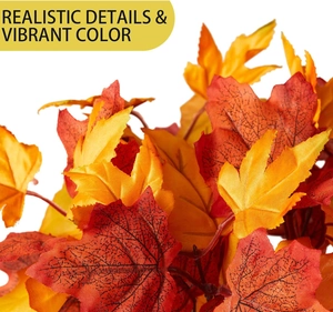 Macro shot of vibrant artificial maple leaves with realistic orange and red fabric texture
