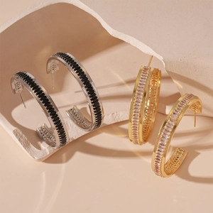 Minimalist C-shaped geometric hoop earrings with zircon stones and luxury metal finish