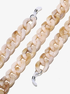 Detailed close-up of marble beige acrylic eyewear chain with adjustable silver connectors