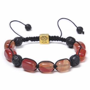 Detailed close-up of woven bracelet with red agate beads and black lava stones