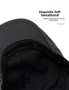 Close-up of internal cotton sweatband on a black beret hat with strong absorption