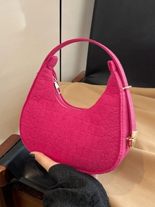 Chic rose red felt crescent shoulder bag with golden hardware for a modern look