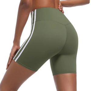 Detail view of olive green high-waisted yoga shorts with side stripes and push-up effect