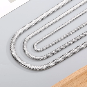 Three widths of silver stainless steel snake bone chains shown in a minimalist layout