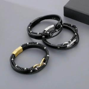 Macro view of multi-layer braided leather bracelets with secure magnetic steel clasps