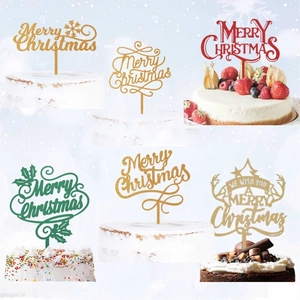 Various glitter Merry Christmas cake toppers with reindeer and snowflake designs