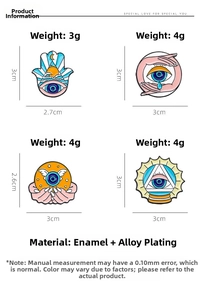 Detail view of four enamel pins including Hamsa Hand and Evil Eye motifs on white background
