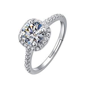 Macro view of snowflake ring with round-cut moissanite and pave diamond accents