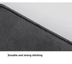 Close-up of the black leather wallet showing reinforced stitching and durable edges