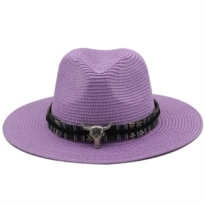 Deep purple woven straw hat with ethnic band and silver bull skull ornament