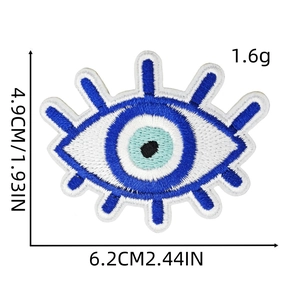 Blue and white embroidered evil eye patch with size dimensions 4.9cm by 6.2cm