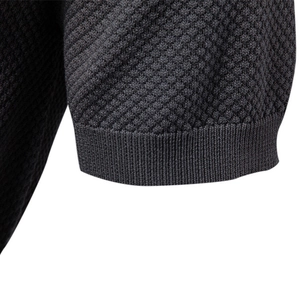 Men's dark grey honeycomb knit polo shirt sleeve with ribbed cuff detail close-up