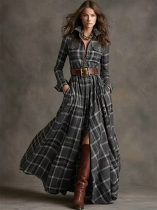 Detail of dark gray plaid midi dress featuring a brown leather belt and shirt collar style