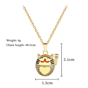Detailed view of lucky cat pendant with dimensions and weight specs in gold finish