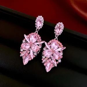 Elegant vintage pink crystal flower drop earrings with silver pins and diamond accents