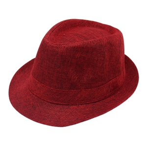Detail of the woven cross texture and teardrop crown on the burgundy trilby hat