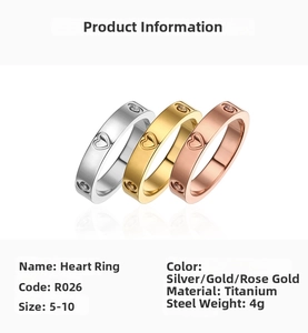 Detailed macro view of titanium steel heart rings in silver, gold and rose gold finishes