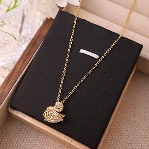 Elegant gold swan pendant necklace featuring zircon pavé set on a fine O-link chain