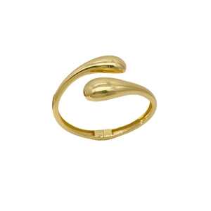 Minimalist gold teardrop open bangle with high-gloss mirror finish and organic shape