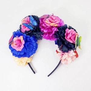 Mexican Day of the Dead headband with colorful artificial flowers and butterflies