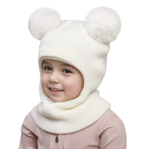 Detail of white knit balaclava for kids with two fluffy pom-poms and warm neck cover