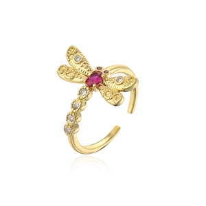Detailed view of dragonfly open ring with red and white zircon in gold finish