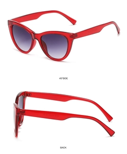 Detail view of red cat eye sunglasses with purple gradient lenses from 45 degree and back