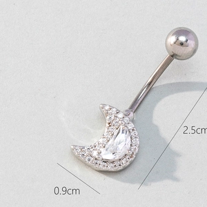 Silver crescent moon belly button ring with white zircon stones and curved bar piercing