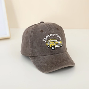 Detail view of brown corduroy kids cap with yellow motor club car embroidery