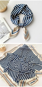 Close-up of geometric pattern silk scarf in navy and beige with elegant knot detail