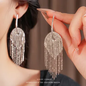 Elegant silver long tassel earrings with sparkling rhinestones and delicate bead chains
