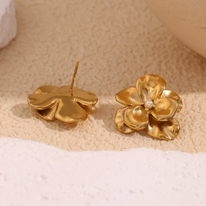 Detailed view of 18K gold plated double-layer petal earrings with delicate pearl accent