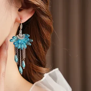 Boucles d'oreilles bohèmes en cristal bleu avec pampilles et crochets en zircon