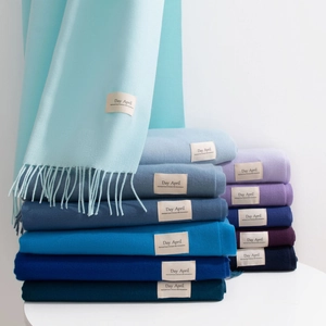 Solid color faux cashmere scarf with tassels in blue and purple gradient shades