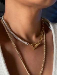 Gold-plated titanium necklace set with zircon paperclip chain and rope chain on a model