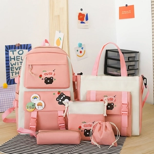 Pink and white 6-piece nylon school backpack set including tote, crossbody, and pencil bags