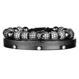 Detailed shot of Forever Love black bracelet set with crown charms and micro zircons