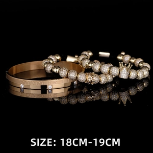 Detail of gold-plated crown bracelet set with FOREVER engraving and micro-pave charms